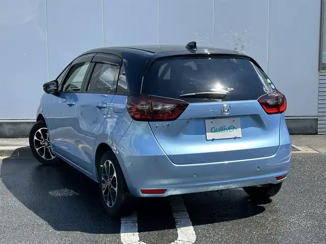 ホンダ フィット ホーム 三重県 2020(令2)年 1.9万km ライトブルー 2トーンカラー（ブラックルーフ/ブラックミラー）/8インチナビ(KENWOOD:彩速ナビ)（Bluetooth/CD/DVD/地デジTV/AM/FM/HDMI/iPod/USB/SD）/ETC/バックカメラ/ドライブレコーダー/ホンダセンシング（衝突軽減ブレーキ/誤発進抑制機能/後方誤発進抑制機能/近距離衝突軽減ブレーキ/歩行者事故低減ステアリング/路外逸脱抑制機能/アダプティブクルーズコントロール/車線維持支援システム/先行車発進お知らせ機能/標識認識機能/オートハイビーム）/LEDヘッドランプ/ハーフシェイドフロントウインドウ/液晶メーター/マルチインフォメーションディスプレイ/オートエアコン/リアヒーターダクト/ハーフレザーシート/社外15インチアルミホイール(スマート純正)/スペアキー