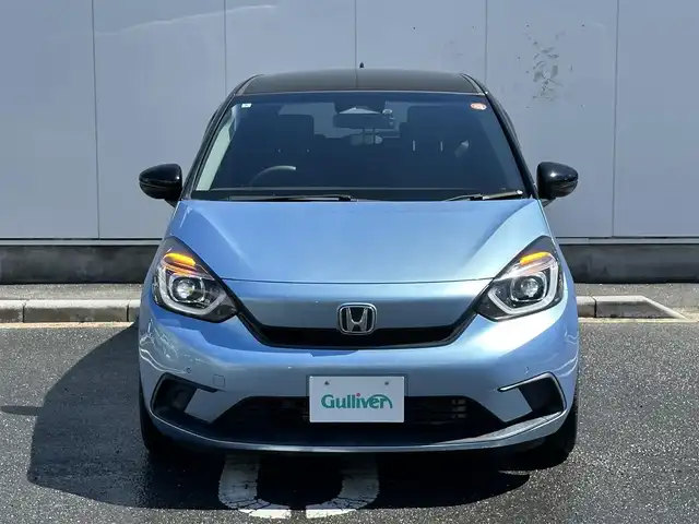 ホンダ フィット ホーム 三重県 2020(令2)年 1.9万km ライトブルー 2トーンカラー（ブラックルーフ/ブラックミラー）/8インチナビ(KENWOOD:彩速ナビ)（Bluetooth/CD/DVD/地デジTV/AM/FM/HDMI/iPod/USB/SD）/ETC/バックカメラ/ドライブレコーダー/ホンダセンシング（衝突軽減ブレーキ/誤発進抑制機能/後方誤発進抑制機能/近距離衝突軽減ブレーキ/歩行者事故低減ステアリング/路外逸脱抑制機能/アダプティブクルーズコントロール/車線維持支援システム/先行車発進お知らせ機能/標識認識機能/オートハイビーム）/LEDヘッドランプ/ハーフシェイドフロントウインドウ/液晶メーター/マルチインフォメーションディスプレイ/オートエアコン/リアヒーターダクト/ハーフレザーシート/社外15インチアルミホイール(スマート純正)/スペアキー