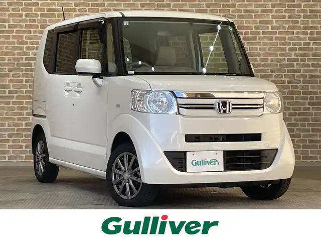 ホンダ Ｎ ＢＯＸ G 岩手県 2015(平27)年 8.7万km プレミアムホワイトパールⅡ ４WD/横滑り防止装置/アイドリングストップ/前席シートヒーター/ヒーテッドドアミラー/純正ナビ/Bluetoothオーディオ接続/ワンセグTV/ETC/ヒルスタートアシスト機能/フロントベンチシート/チップアップリアシート/オートエアコン/スマートキーシステム/ヘッドライトレベライザー/14インチアルミホイール/純正フロアマット