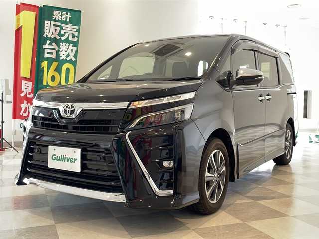 トヨタ ヴォクシー ZS 煌Ⅱ 福井県 2019(平31)年 6.9万km ブラック ALPINE7インチナビ/フルセグTV/バックモニター/ALPINEフリップダウンモニター/トヨタセーフティーセンス/クルーズコントロール/コーナーセンサー/前後ドライブレコーダー/ETC/両側パワースライドドア/LEDヘッドライト/オートライト/オートハイビーム/MTモード付AT/純正16インチAW/プッシュスタート/スマートキー/純正フロアマット