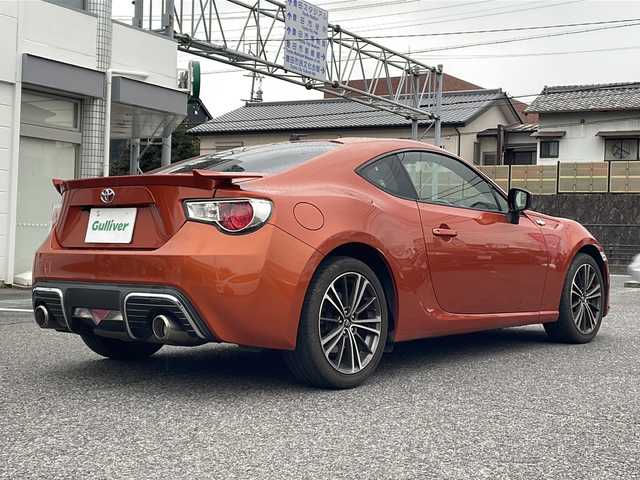 トヨタ ８６ GT リミテッド 愛知県 2013(平25)年 10.6万km オレンジメタリック HDDナビ（NHZD-W62G）/・Bluetooth/・フルセグTV/・AM/FM/・CD/DVD/社外セキュリティ/ETC/ドライブレコーダー前方（TZ-D102）/シートヒーター前席/オートエアコン/バックモニター/純正フロアマット/オートエアコン/パドルシフト/取扱説明書/スマートキー2本