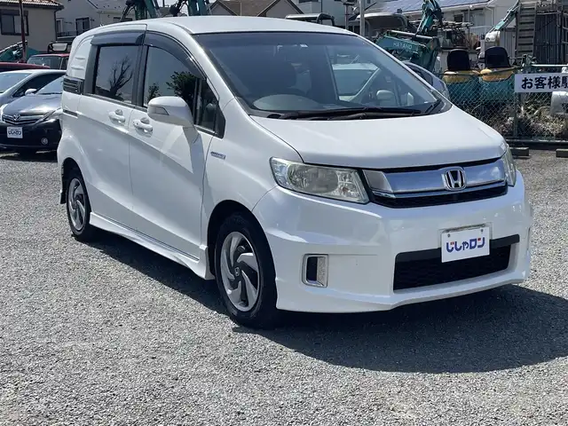 ホンダ フリード スパイク ハイブリット ジャストセレクション 神奈川県 2014(平26)年 9万km ホワイトオーキッドパール (株)IDOMが運営する【じしゃロン秦野店】の自社ローン専用車両になります。こちらは現金またはオートローンご利用時の価格です。自社ローンご希望の方は別途その旨お申付け下さい/純正SDナビ/CD/DVD/Bluetooth/地デジTV/バックカメラ/ETC/両側パワースライドドア/クルーズコントロール/スマートキー×2/純正フリップダウンモニター/横スベり防止機能/純正ホイールキャップ