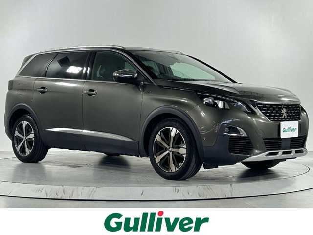 プジョー ５００８ GT ブルーHDi 佐賀県 2019(令1)年 7.7万km アマゾナイトグレー 純正9.2インチディプレイオーディオ/ＡＭ/ＦＭ/Bluetooth/サンルーフ/バック・フロントカメラ/クルーズコントロール(追従あり)/前後ドライブレコーダー/衝突被害軽減システム/ブラインドスポットモニター/レーンアシスト/パワーバックドア/パワーシート/シートメモリ/シートヒーター/ダウンヒルアシストコントロール/ルーフレール/ETC/LEDヘッドライト/フォグランプ/オートエアコン/盗難防止装置/横滑り防止装置/車線逸脱警報/オートライト/オートマチックハイビーム/スマートキー/スペアキー有/プッシュスタート/純正フロアマット/純正18インチアルミホイール	/パドルシフト/電子パーキング/ステアリングスイッチ/電動格納ミラー/コーナーセンサー