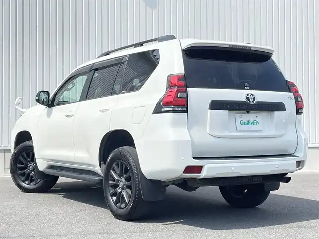 トヨタ ランドクルーザー プラド TX Lパッケージ マットブラED 群馬県 2023(令5)年 3.6万km ホワイトパールクリスタルシャイン ワンオーナー/7人乗り/4WD/寒冷地仕様/ディーラー純正SDナビ/（CD/DVD/HDMI/Bluetooth/フルセグ）/バックカメラ/トヨタセーフティセンス/・プリクラッシュセーフティ/・レーダークルーズコントロール/・レーンディパーチャーアラート/・オートマチックハイビーム/・先行車発進告知機能/サンルーフ/ベージュレザーシート/プッシュスタート/前後ドライブレコーダー/ビルトインETC/オートエアコン/前席パワーシート/エアーシート/全席シートヒーター/ウッドコンビパネル/ステアリングスイッチ/社外フロアマット/純正18インチAW/F/Rコーナーセンサー/ルーフレール/LED/スペアキー×1/保証証/取説