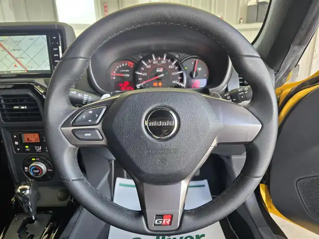ダイハツ コペン GRスポーツ 鹿児島県 2021(令3)年 2.7万km ジョーヌイエロー ワンオーナー　/ターボ車　/ＥＴＣ　/ＧＲ専用ＢＢＳアルミホイール（１６インチ）　/社外ＳＤナビ（ＣＮ－ＲＥ０７ＷＤ）　/Ｂｌｕｅｔｏｏｔｈオーディオ　/ＧＲ専用ＦｕｎｃｔｉｏｎａｌＭＡＴＲＩＸグリル　/パドルシフト/ＭＴモード付きＡＴ/D+N席シートヒーター/GR専用RECAROシート/横滑り防止装置/LEDヘッドライト/アイドリングストップ/プッシュスタート/スマートキー