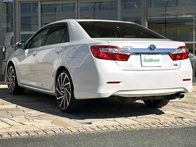 トヨタ カムリ ハイブリット Gパッケージ 静岡県 2014(平26)年 8.3万km ホワイトパールクリスタルシャイン 純正SDナビ/・DVD/・CD/・Bluetooth/・フルセグTV/・USB/主要装備/・バックカメラ/・社外フロントバンパー/・社外ヘッドライト/・社外アルミホイール/・純正純正フロアマット/・ステアリングリモコン/・ドライブレコーダー前後/・EVモード/・ecoモード/・クルーズコントロール/・社外フロントバンパー/・社外ヘッドライト/・社外アルミホイール/・純正純正フロアマット/・ステアリングリモコン/・ドアバイザー/・LEDヘッドライト/・オートライト/・プッシュスタート/・スマートキー/・スペアキー/・ETC/・パワーウィンドウ/・パワーステアリング/・アイドリングストップ