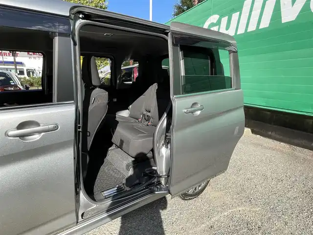 スズキ ソリオ バンディット HV MV 東京都 2021(令3)年 2.5万km プレミアムシルバーメタリック ワンオーナー/純正9インチメモリナビ/(フルセグ/DVD/CD/スマートフォン連携機能)/アラウンドビューモニター/セーフティーサポート/・アダプティブクルーズコントロール/・デュアルカメラブレーキサポート/・車線逸脱警報機能/・前後方誤発進抑制機能/・後退時ブレーキサポート/・リアパーキングセンサー/ヘッドアップディスプレイ/両側パワースライドドア/LEDライト/純正フロアマット/ロールサンシェード/前後ドライブレコーダー(DRV-MR450)/ETC/取扱説明書/保証書/スペアキー×1