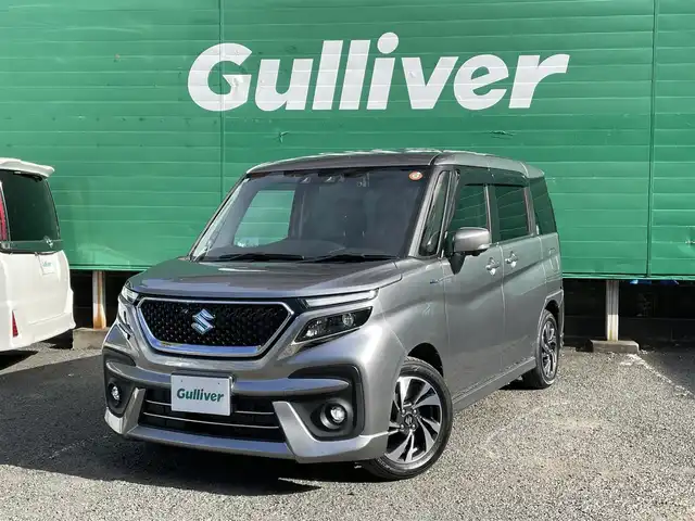スズキ ソリオ バンディット HV MV 東京都 2021(令3)年 2.5万km プレミアムシルバーメタリック ワンオーナー/純正9インチメモリナビ/(フルセグ/DVD/CD/スマートフォン連携機能)/アラウンドビューモニター/セーフティーサポート/・アダプティブクルーズコントロール/・デュアルカメラブレーキサポート/・車線逸脱警報機能/・前後方誤発進抑制機能/・後退時ブレーキサポート/・リアパーキングセンサー/ヘッドアップディスプレイ/両側パワースライドドア/LEDライト/純正フロアマット/ロールサンシェード/前後ドライブレコーダー(DRV-MR450)/ETC/取扱説明書/保証書/スペアキー×1