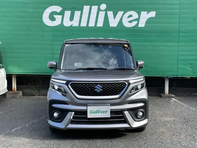 スズキ ソリオ バンディット HV MV 東京都 2021(令3)年 2.5万km プレミアムシルバーメタリック 外部検査実施済み/ワンオーナー/純正9インチメモリナビ/(フルセグ/DVD/CD/スマートフォン連携機能)/アラウンドビューモニター/セーフティーサポート/・アダプティブクルーズコントロール/・デュアルカメラブレーキサポート/・車線逸脱警報機能/・前後方誤発進抑制機能/・後退時ブレーキサポート/・リアパーキングセンサー/ヘッドアップディスプレイ/両側パワースライドドア/LEDライト/純正フロアマット/ロールサンシェード/前後ドライブレコーダー(DRV-MR450)/ETC/取扱説明書/保証書/スペアキー×1