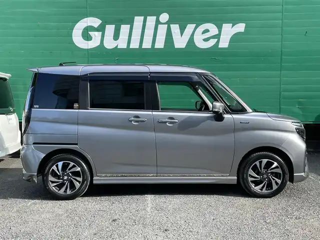 スズキ ソリオ バンディット HV MV 東京都 2021(令3)年 2.5万km プレミアムシルバーメタリック 外部検査実施済み/ワンオーナー/純正9インチメモリナビ/(フルセグ/DVD/CD/スマートフォン連携機能)/アラウンドビューモニター/セーフティーサポート/・アダプティブクルーズコントロール/・デュアルカメラブレーキサポート/・車線逸脱警報機能/・前後方誤発進抑制機能/・後退時ブレーキサポート/・リアパーキングセンサー/ヘッドアップディスプレイ/両側パワースライドドア/LEDライト/純正フロアマット/ロールサンシェード/前後ドライブレコーダー(DRV-MR450)/ETC/取扱説明書/保証書/スペアキー×1