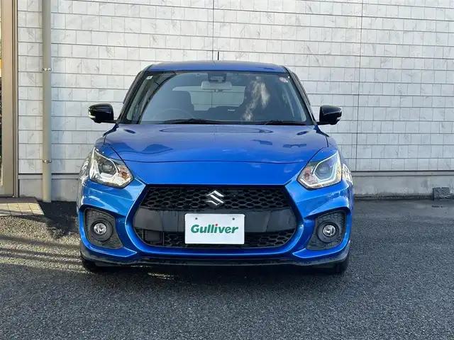 スズキ スイフト スポーツ 大分県 2020(令2)年 10.5万km スピーディーブルーM 〇ワンオーナー/〇純正メモリーナビ（CN-RZ856）/　CD/DVD/BT/フルセグ/〇全方位カメラ/〇社外GReddyリアスポイラー/〇ETC/〇パドルシフト/〇ACC/〇LKA/〇フロアマット/〇ドアバイザー/〇プライバシーガラス/〇革巻きステアリング/〇前後ドライブレコーダー/〇ステアリングスイッチ/〇ウインカーミラー/〇純正LEDヘッドライト/〇純正フォグランプ/〇純正バックフォグ/〇保証書/〇取扱説明書/〇スマートキー/〇エンジンプッシュスタート