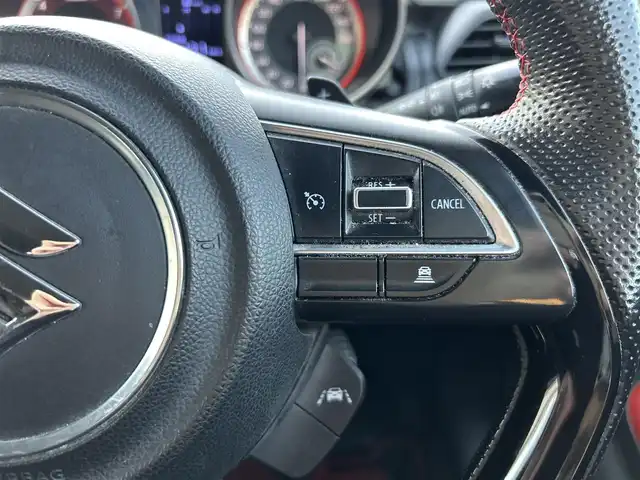 スズキ スイフト スポーツ 大分県 2020(令2)年 10.5万km スピーディーブルーM 〇ワンオーナー/〇純正メモリーナビ（CN-RZ856）/　CD/DVD/BT/フルセグ/〇全方位カメラ/〇社外GReddyリアスポイラー/〇ETC/〇パドルシフト/〇ACC/〇LKA/〇フロアマット/〇ドアバイザー/〇プライバシーガラス/〇革巻きステアリング/〇前後ドライブレコーダー/〇ステアリングスイッチ/〇ウインカーミラー/〇純正LEDヘッドライト/〇純正フォグランプ/〇純正バックフォグ/〇保証書/〇取扱説明書/〇スマートキー/〇エンジンプッシュスタート