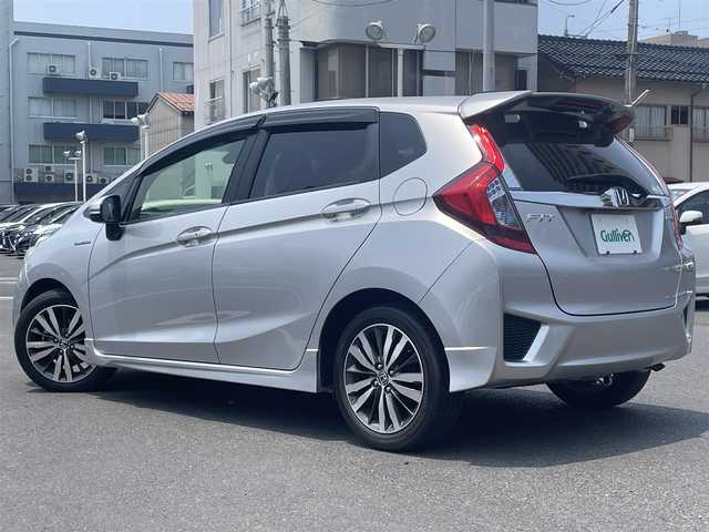 ホンダ フィット ハイブリット Sパッケージ 島根県 2016(平28)年 4.4万km アラバスターシルバーメタリック 純正ディスプレイオーディオ/ワンセグTV/Bluetooth接続/CD再生/HDMI/USB/FM・AM/バックカメラ/ETC/衝突軽減ブレーキ/アイドリングストップ/横滑り防止装置/ABS/スマートキー/プッシュスタート/LEDヘッドライト/フォグランプ/パドルシフト/純正16インチアルミホイール/純正フロアマット
