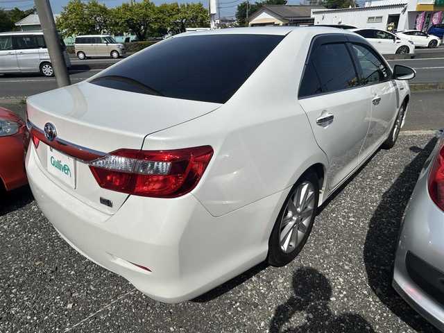 トヨタ カムリ ハイブリット レザーパッケージ 神奈川県 2012(平24)年 8.3万km ホワイトパールクリスタルシャイン ・純正ナビ（BT/CD/DVD/USB/AUX/ワンセグ)/・バックカメラ/・クルーズコントロール/・横滑り防止装置/・オートライト/・LED/・スマートキー/・パワーシート/・パワーステアリング/・パワーウィンドウ/・取扱説明書/・保証書