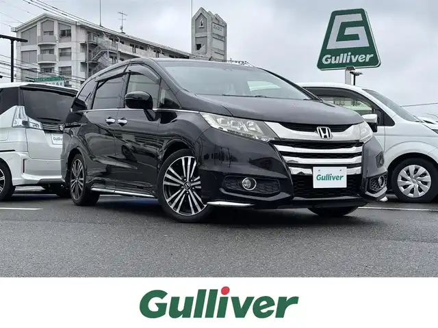 ホンダ オデッセイ アブソルート・EXホンダセンジング 大分県 2017(平29)年 8万km クリスタルブラックパール ・純正ナビ(CD.DVD.SD.BT)/・バックカメラ/・フルセグテレビ/・フリップダウンモニター/・レーダークルーズコントロール/・両側パワースライド/・ETC/・衝突軽減ブレーキ/・ブラインドスポットモニター/・パドルシフト/・オートライト