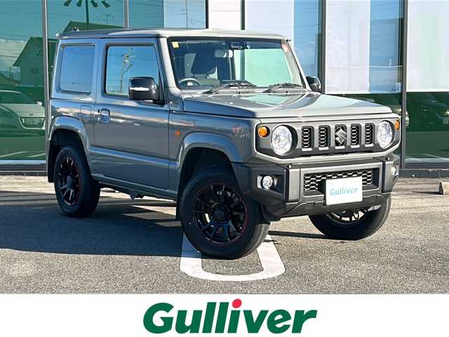 スズキ ジムニー XC 岐阜県 2023(令5)年 1.7万km ミディアムグレー 登録時走行距離：16214km/ナビ/バックカメラ/フルセグテレビ・Bluetooth/RAYSアルミホイール/シートヒーター/レーダークルーズコントロール/レーンキープアシスト/MT/４WD/ドライブレコーダー/背面タイヤ/LEDヘッドライト/オートライト/フォグライト/純正フロアマット/プッシュスタート/スマートキー