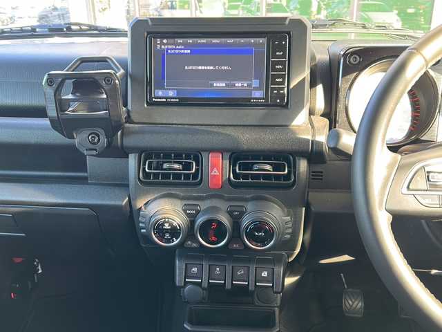 スズキ ジムニー XC 岐阜県 2023(令5)年 1.7万km ミディアムグレー 登録時走行距離：16214km/ナビ/バックカメラ/フルセグテレビ・Bluetooth/RAYSアルミホイール/シートヒーター/レーダークルーズコントロール/レーンキープアシスト/MT/４WD/ドライブレコーダー/背面タイヤ/LEDヘッドライト/オートライト/フォグライト/純正フロアマット/プッシュスタート/スマートキー