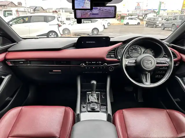 マツダ マツダ３ファストバック XD バーガンディセレクション 宮城県 2021(令3)年 8.5万km マシーングレープレミアムM BOSEサウンドシステム/360度セーフティパッケージ/・360度ビューモニター/・ドライバーモニタリング/＝＝＝/スマートブレーキサポート/AT誤発進抑制制御/全車速追従機能付レーダークルーズコントロール/クルージングトラフィックサポート/車線逸脱警報システム/レーンキープアシスト/前後側方接近車両検知/ブラインドスポットモニタリング/パーキングセンサー（フロント/リア）/ドライバーアテンションアラート/マツダコネクト8.8インチセンターディスプレイ/・CD/DVD/・Bluetooth/・フルセグTV/ヘッドアップディスプレイ/ビルトインETC/ミラー一体型ドライブレコーダー/本革シート/運転席メモリー機能付パワーシート/シートヒーター/ステアリングヒーター/革巻きステアリング/パドルシフト/ステアリングスイッチ/電動パーキングブレーキ/ブレーキホールド/アダプティブLEDヘッドランプ/オートライト/スマートキー＆プッシュスタート/電動格納ミラー/純正18インチAW/純正フロアマット/トノカバー