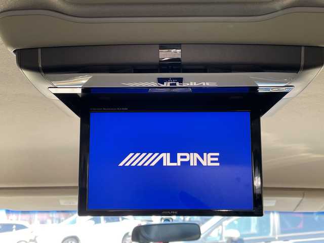 日産 エルグランド 250HWS アーバンクロム ブラックレザー 山口県 2012(平24)年 11.2万km ブリリアントホワイトパール ワンオーナー車/純正メモリナビ/Bluetooth/フルセグTV/バックカメラ/社外フリップダウンモニター/両側パワースライドドア/フロントエアロ/キセノンライト/フォグライト/オートライト/前席シートヒーター/前席パワーシート/スマートキー＆プッシュスタート/2列目オットマン/純正18インチAW/保証書・取説