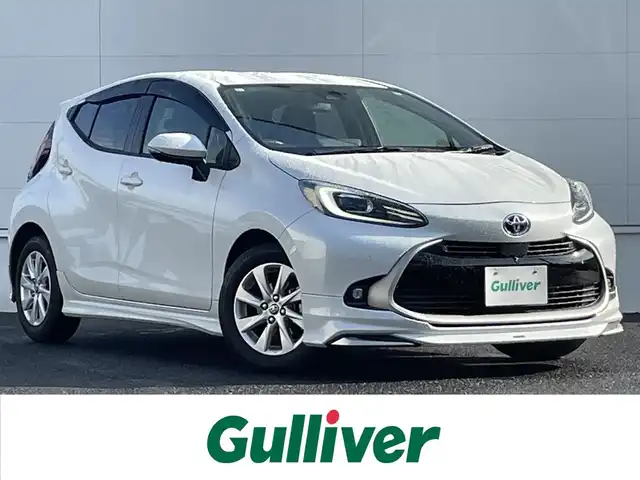 トヨタ アクア Z 佐賀県 2021(令3)年 1.9万km プラチナホワイトパールマイカ モデリスタエアロ(F/S/R)/トヨタセーフティセンス/・プリクラッシュセーフティ/・レーントレーシングアシスト/・レーダークルーズコントロール/・オートマチックハイビーム/ブラインドスポットモニター/クリアランスソナー/純正10.5型ディスプレイオーディオ/・コネクティッドナビ/・パノラミックビューモニター/・フルセグTV/BT/・CD/DVDデッキ/純正15インチAW/LEDヘッドライト/フォグランプ/プッシュスタート/スペアタイヤ/スペアキー×1/取扱説明書/保証書