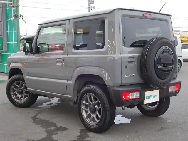 スズキ ジムニー XC 静岡県 2024(令6)年 0.6万km ミディアムグレー ワンオーナー・禁煙車/スズキセーフティーサポート/　デュアルセンサーブレーキ/　誤発進抑制機能/　車線逸脱警報/　ふらつき警報/　先行車発進お知らせ機能/　ハイビームアシスト/クルーズコントロール/LEDヘッドライト/カロッツェリアディスプレイオーディオ/　DVD・CD・BT・USB/ステアリングリモコン対応/バックカメラ/ETC2.0/社外3Dフロアマット/オートアエコン/前席シートヒーター/スマートキー２個