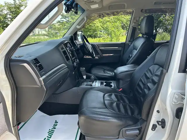 三菱 パジェロ ロング エクシード 山形県 2014(平26)年 8.9万km ウォームホワイトパール 4WD/ロックフォードサウンドシステム/後席用ヘッドレストモニター/純正SDナビ/　　【CD DVD BT ワンセグ USB】/バックカメラ/クルーズコントロール/HIDオートヘッドライト/ドライブレコーダー/ステアリングスイッチ/MTモード付AT/電動格納ウィンカーミラー/フォグランプ/WAC/リモコンキー/ETC