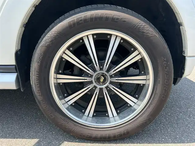 三菱 パジェロ ロング エクシード 山形県 2014(平26)年 8.9万km ウォームホワイトパール 4WD/ロックフォードサウンドシステム/後席用ヘッドレストモニター/純正SDナビ/　　【CD DVD BT ワンセグ USB】/バックカメラ/クルーズコントロール/HIDオートヘッドライト/ドライブレコーダー/ステアリングスイッチ/MTモード付AT/電動格納ウィンカーミラー/フォグランプ/WAC/リモコンキー/ETC