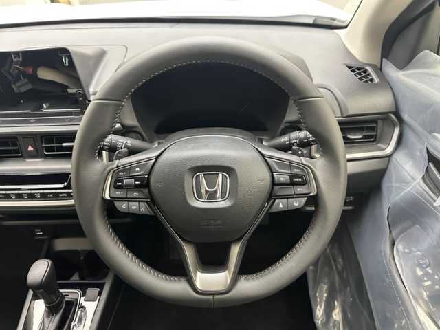 ホンダ ＷＲ－Ｖ Z 兵庫県 2025(令7)年 0.1万km未満 プラチナホワイトパール 登録済み未使用車/ハーフレザーシート/レーダークルーズコントロール/衝突軽減ブレーキ/レーンキープアシスト/リアパーキングセンサー/パドルシフト/本革巻きステアリング/LEDヘッドライト/LEDフォグライト/オートライト/オートハイビーム/スマートキー/純正17インチアルミホイール