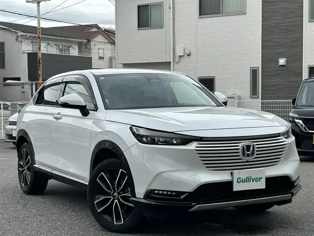 ホンダ ヴェゼル ハイブリッド e:HEV Z 兵庫県 2024(令6)年 1.6万km プラチナホワイトパール ホンダコネクトディスプレイ/プレミアムオーディオ(10スピーカー)/マルチビューカメラ/ホンダセンシング/・追従クルーズコントロール/・誤発進抑制/・近距離衝突軽減ブレーキ/・車線維持システム/・標識認識/・オートハイビーム/・パーキングセンサー/・LEDアクティブコーナリングライト/ハンズフリーパワバックドア/左右独立オートエアコン/ステアリングヒーター/ETC/マット・バイザー/取説・保証書