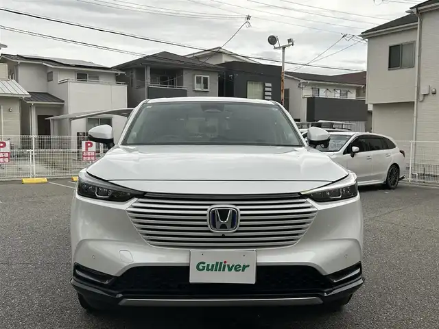 ホンダ ヴェゼル ハイブリッド e:HEV Z 兵庫県 2024(令6)年 1.6万km プラチナホワイトパール ホンダコネクトディスプレイ/プレミアムオーディオ(10スピーカー)/マルチビューカメラ/ホンダセンシング/・追従クルーズコントロール/・誤発進抑制/・近距離衝突軽減ブレーキ/・車線維持システム/・標識認識/・オートハイビーム/・パーキングセンサー/・LEDアクティブコーナリングライト/ハンズフリーパワバックドア/左右独立オートエアコン/ステアリングヒーター/ETC/マット・バイザー/取説・保証書