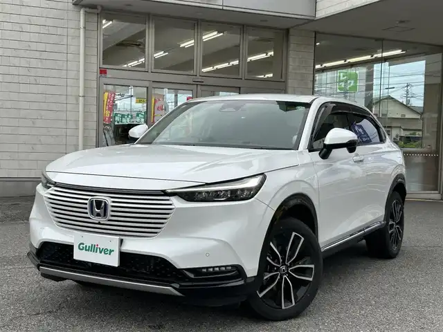 ホンダ ヴェゼル ハイブリッド e:HEV Z 兵庫県 2024(令6)年 1.6万km プラチナホワイトパール ホンダコネクトディスプレイ/プレミアムオーディオ(10スピーカー)/マルチビューカメラ/ホンダセンシング/・追従クルーズコントロール/・誤発進抑制/・近距離衝突軽減ブレーキ/・車線維持システム/・標識認識/・オートハイビーム/・パーキングセンサー/・LEDアクティブコーナリングライト/ハンズフリーパワバックドア/左右独立オートエアコン/ステアリングヒーター/ETC/マット・バイザー/取説・保証書