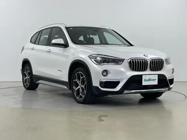 ＢＭＷ Ｘ１ xDrive 18d xライン 道央・札幌 2018(平30)年 5.1万km ミネラルホワイト ・４WD/ディーゼルターボ/・インテリジェントセーフティ/・衝突回避・被害軽減ブレーキ/・ダイナミック・スタビリティ・コントロール/・純正メーカーナビ/・DVD.CD.フルセグ.Bluetooth/・バックカメラ /USB/・パワーバックドア /レザーシート/・運転席+助手席パワーシート/シートヒーター/・ドライブレコーダー360度/・LEDライト/オートライト/・ルームミラー一体型　ETC/・スタッドレスタイヤ積込
