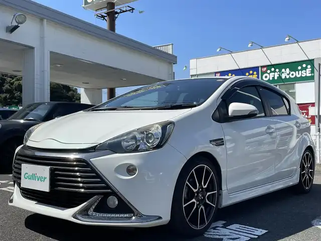 トヨタ アクア G G’s 長崎県 2014(平26)年 13.2万km ライムホワイトパールクリスタルシャイン 純正ディーラーナビ(FM/AM/CD/DVD/BT/TV)/プッシュスタート/ドライビングモードセレクト/バックカメラ/社外ドライブレコーダー/ALPINE製ツイーター/ETC/ハーフレザーシート/G’s純正AW/純正フロアマット/電格ウィンカーミラー/ヘッドライトレベライザ/オートライト/ABS/VSC/スマートキー/USB入力端子/取扱説明書/保証書