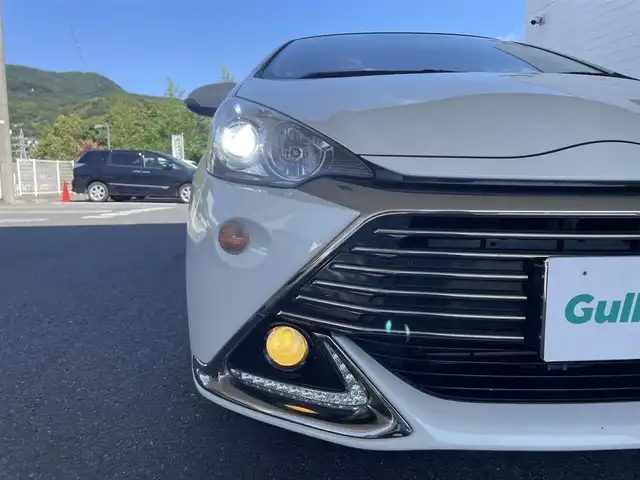 トヨタ アクア G G’s 長崎県 2014(平26)年 13.2万km ライムホワイトパールクリスタルシャイン 純正ディーラーナビ(FM/AM/CD/DVD/BT/TV)/プッシュスタート/ドライビングモードセレクト/バックカメラ/社外ドライブレコーダー/ALPINE製ツイーター/ETC/ハーフレザーシート/G’s純正AW/純正フロアマット/電格ウィンカーミラー/ヘッドライトレベライザ/オートライト/ABS/VSC/スマートキー/USB入力端子/取扱説明書/保証書