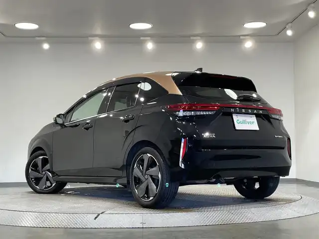 日産 オーラ G レザーエディション 愛知県 2023(令5)年 7.8万km ミッドナイトブラック/サンライズカッパー 純正9インチナビ/BOSEサウンド/プロパイロット/衝突軽減ブレーキ/アラウンドビューモニター/ビルトインETC2.0/シートヒーター/LEDヘッドライト/ドライブレコーダー/ワイヤレス充電/デジタルインナーミラー/ブラインドスポットモニター/ステアリングヒーター/フルセグTV/Bluetooth/コーナーセンサー/レーンキープアシスト/オートハイビーム/HDMI接続/Carplay/プッシュスタート/USB接続/スマートキー/純正フロアマット/純正アルミホイール/オートライト/本革シート/禁煙車/寒冷地仕様/ウィンカーミラー/電動格納ミラー/フォグランプ/ステアリングリモコン/電動パーキングブレーキ/オートブレーキホールド/オートエアコン