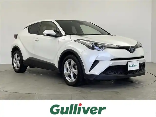 トヨタ Ｃ－ＨＲ S LEDパッケージ 鹿児島県 2019(令1)年 5.1万km ホワイトパールクリスタルシャイン 純正7インチナビ/（CD/DVD/BT/フルセグTV）/レーダークルーズコントロール/プリクラッシュセーフティ/レーンディパーチャーアシスト/電動パーキングブレーキ/オートホールド機能/オートライト/オートマチックハイビーム/バックカメラ/ビルトインETC/純正アルミホイール/純正ドアバイザー/スマートキー/プッシュスタート/取説、保証書