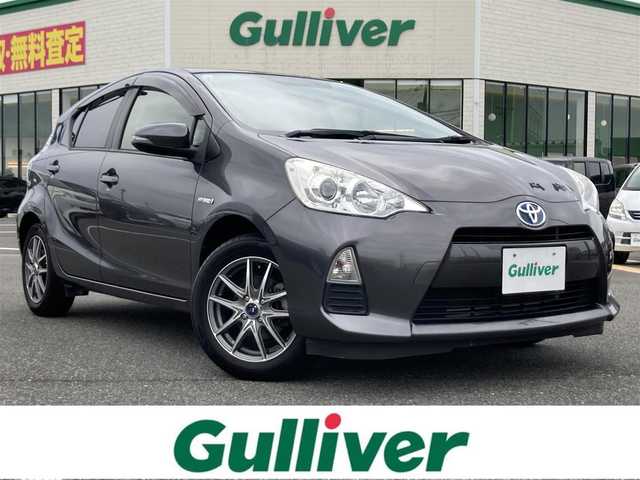 トヨタ アクア S 鳥取県 2013(平25)年 4.9万km グレーメタリック 純正オーディオ/CD/AUX/ETC/社外15インチアルミホイール/プッシュエンジンスタート/スマートキー/アイドリングストップ/ウィンカーミラー/電動格納ミラー/オートライト/ステアリングスイッチ/フロアマット・ドアバイザー/スタットレスアルミセット積込/（2024年製タイヤ溝８部山）