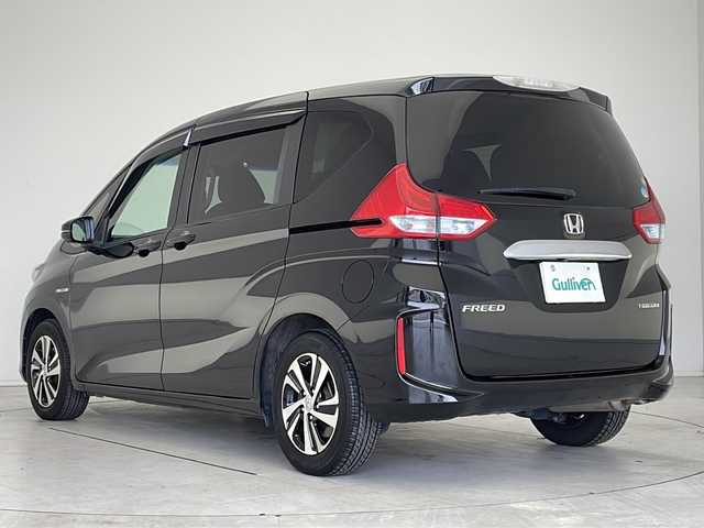 ホンダ フリード ハイブリット EX 愛知県 2019(平31)年 10万km プレミアムスパークルブラックパール 衝突被害軽減ブレーキ/純正１０インチSDナビ　ナビあり/フリップダウンモニター/両側パワースライドドア/クルーズコントロール/シートヒーター/フルセグTV/CD DVD/Bluetooth/バックカメラ/純正アルミホイール/LEDヘッドライト/レーンキープアシスト/ドライブレコーダー/ETC/ステアリングスイッチ/スマートキー/プッシュスタート