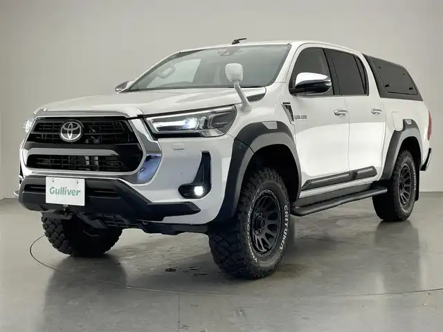 トヨタ ハイラックス Z 愛知県 2021(令3)年 1.1万km スーパーホワイトⅡ 純正ナビ　バックカメラ　ＡＥＲＯＫＬＡＳキャノピー　ＪＢＬスピーカー　ＥＴＣ　純正ドラレコ　ＢＡＴＴＬＥＺリフトアップサス　ＧＲサイドステップ　純正オーバーフェンダー　ＴＲＤフィルム　衝突軽減　純正パーツ純正AW積込　保証書　ワンオナ　禁煙車　ブロックタイヤ　コーナーセンサー　ヘッドライトウォッシャー　コーナーセンサー　社外シフトノブ　社外ステアリング