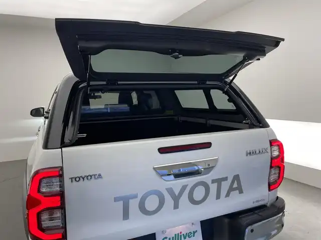 トヨタ ハイラックス Z 愛知県 2021(令3)年 1.1万km スーパーホワイトⅡ 純正ナビ　バックカメラ　ＡＥＲＯＫＬＡＳキャノピー　ＪＢＬスピーカー　ＥＴＣ　純正ドラレコ　ＢＡＴＴＬＥＺリフトアップサス　ＧＲサイドステップ　純正オーバーフェンダー　ＴＲＤフィルム　衝突軽減　純正パーツ純正AW積込　保証書　ワンオナ　禁煙車　ブロックタイヤ　コーナーセンサー　ヘッドライトウォッシャー　コーナーセンサー　社外シフトノブ　社外ステアリング