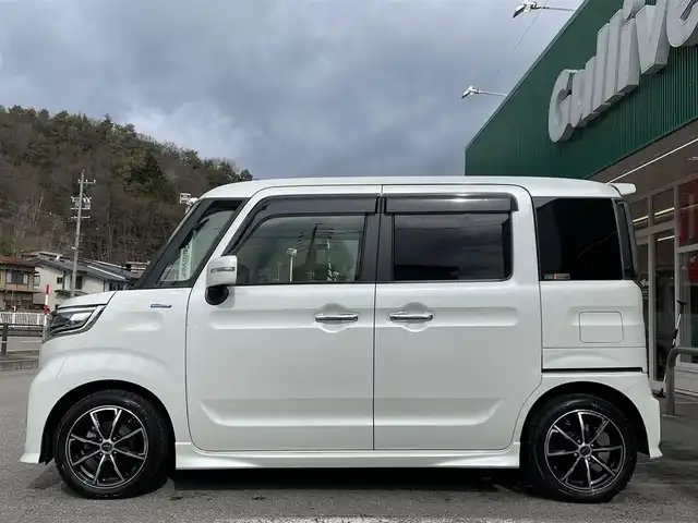 スズキ スペーシア カスタム HYBRID XS ターボ 岐阜県 2023(令5)年 2.1万km ピュアホワイトP /ワンオーナー//純正SDナビ/（AM.FM.フルセグTV.Bluetooth）//積み込み純正サマータイヤ4本//シートヒーター//バックカメラ//アイドリングストップ//プッシュスタート//両側パワースライドドア//フォグランプ//ETC