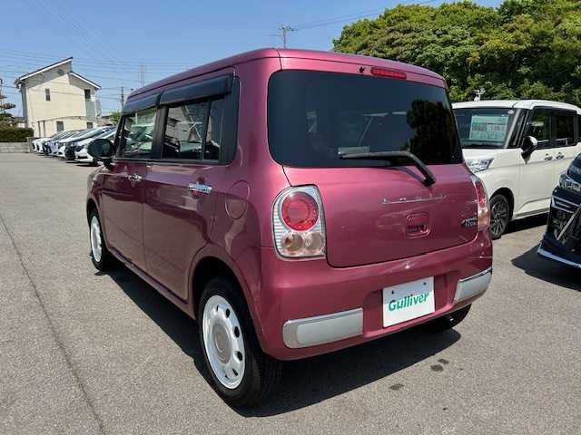 スズキ ラパン ショコラ X 大阪府 2013(平25)年 8.8万km カシスピンクパールメタリック 盗難防止装置/ABS/アイドリングストップ/レザーシート/オートライト/キセノンヘッドライト/純正アルミホイール/スマートキー/フルフラットシート/ミュージックサーバー/オートエアコン/プッシュスタート/ETC