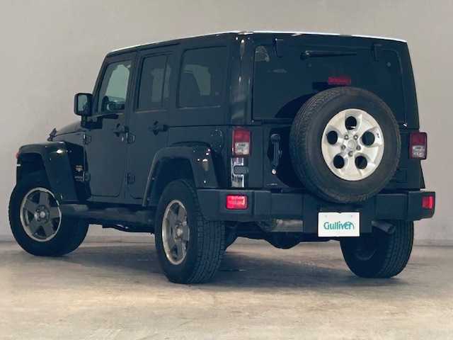 クライスラー・ジープ ジープ ラングラー アンリミテッド サハラ 宮城県 2014(平26)年 5.1万km ブラック 4WD/純正ナビ/バックカメラ/Bluetooth、CD/クルーズコントロール/ヒルディセントコントロール/オートライト/MTモード付きAT/背面タイヤ/本革レザーシート/シートヒーター/純正アルミホイール/純正フロアマット/前後ドライブレコーダー/ETC/USB入力端子/横滑り防止装置