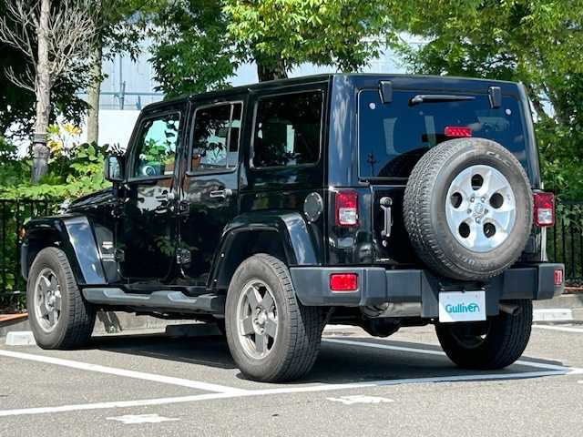 クライスラー・ジープ ジープ ラングラー アンリミテッド サハラ 宮城県 2014(平26)年 5.1万km ブラック 4WD/純正ナビ/バックカメラ/Bluetooth、CD/クルーズコントロール/ヒルディセントコントロール/オートライト/MTモード付きAT/背面タイヤ/本革レザーシート/シートヒーター/純正アルミホイール/純正フロアマット/前後ドライブレコーダー/ETC/USB入力端子/横滑り防止装置