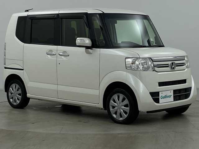ホンダ Ｎ ＢＯＸ G SSパッケージ 道央・札幌 2017(平29)年 5.9万km プレミアムホワイトパールⅡ ・4WD/・純正ナビ/　CD/DVD/BT/SD/・フルセグTV/・バックカメラ/・両側パワースライドドア /・前席シートヒーター/・ビルトインETC/・プッシュスタート/・スマートキー/・オートライト/・HIDヘッドライト/・オートリトラミラー/・ミラーヒーター/・スペアキー/・積込タイヤ