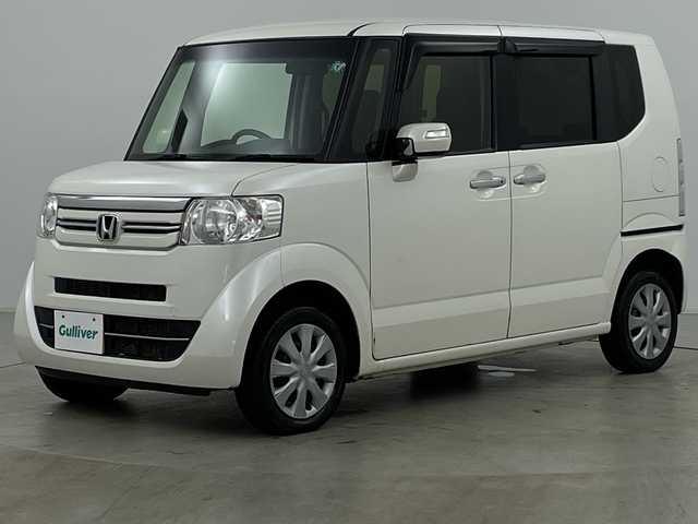 ホンダ Ｎ ＢＯＸ G SSパッケージ 道央・札幌 2017(平29)年 5.9万km プレミアムホワイトパールⅡ ・4WD/・純正ナビ/　CD/DVD/BT/SD/・フルセグTV/・バックカメラ/・両側パワースライドドア /・前席シートヒーター/・ビルトインETC/・プッシュスタート/・スマートキー/・オートライト/・HIDヘッドライト/・オートリトラミラー/・ミラーヒーター/・スペアキー/・積込タイヤ