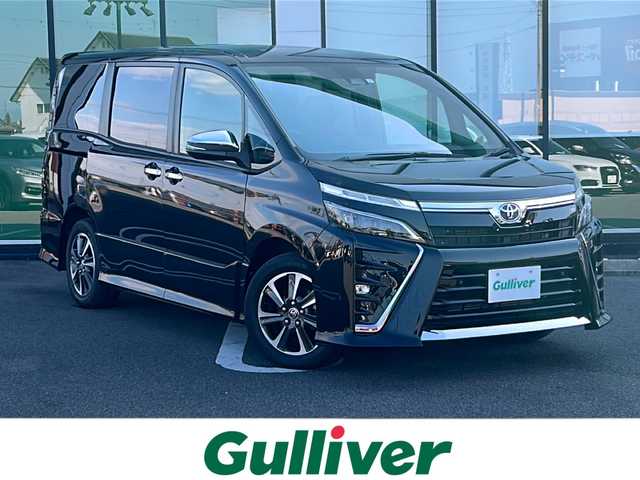 トヨタ ヴォクシー ZS 煌Ⅱ 岐阜県 2021(令3)年 4.3万km ブラック 登録時走行距離：42229km/ワンオーナー/純正１０インチナビ（NSZT-ZA4T）/バックカメラ/フルセグテレビ・Bluetooth/クルーズコントロール/トヨタセーフティーセンス/レーンディパーチャーアラート/コーナーセンサー/クルーズコントロール/両側パワースライドドア/LEDヘッドライト/オートライト/オートマチックハイビーム/ビルトインETC/ハーフレザーシート/純正16インチアルミホイール/プッシュスタート/スマートキー/保証書