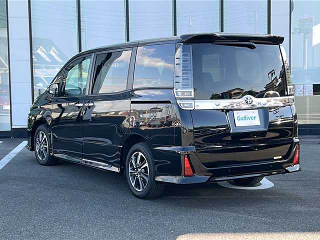 トヨタ ヴォクシー ZS 煌Ⅱ 岐阜県 2021(令3)年 4.3万km ブラック 登録時走行距離：42229km/ワンオーナー/純正１０インチナビ（NSZT-ZA4T）/バックカメラ/フルセグテレビ・Bluetooth/クルーズコントロール/トヨタセーフティーセンス/レーンディパーチャーアラート/コーナーセンサー/クルーズコントロール/両側パワースライドドア/LEDヘッドライト/オートライト/オートマチックハイビーム/ビルトインETC/ハーフレザーシート/純正16インチアルミホイール/プッシュスタート/スマートキー/保証書