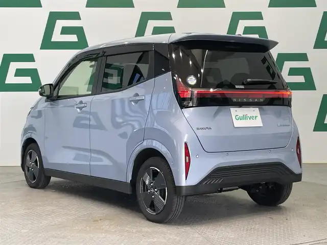 日産 サクラ X 鹿児島県 2023(令5)年 1.1万km ライトブルー ナビ/(フルセグTV/Bluetooth/DVD/CD)/インテリジェント エマージェンシーブレーキ/踏み間違い衝突防止アシスト/インテリジェント LI（車線逸脱防止支援システム）/インテリジェント FCW（前方衝突予測警報）/インテリジェント DA（ふらつき警報）/標識検知機能/先行車発進お知らせ/電動パーキングブレーキ/オートブレーキホールド/ETC/純正アルミホイール/純正フロアマット/LEDヘッドライト/スマートキー