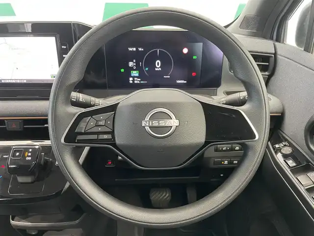 日産 サクラ X 鹿児島県 2023(令5)年 1.1万km ライトブルー ナビ/(フルセグTV/Bluetooth/DVD/CD)/インテリジェント エマージェンシーブレーキ/踏み間違い衝突防止アシスト/インテリジェント LI（車線逸脱防止支援システム）/インテリジェント FCW（前方衝突予測警報）/インテリジェント DA（ふらつき警報）/標識検知機能/先行車発進お知らせ/電動パーキングブレーキ/オートブレーキホールド/ETC/純正アルミホイール/純正フロアマット/LEDヘッドライト/スマートキー